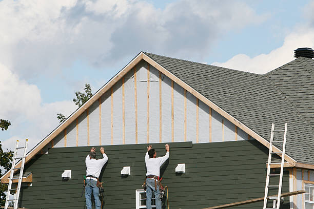 Professional Siding Repair technician working in Rex, GA